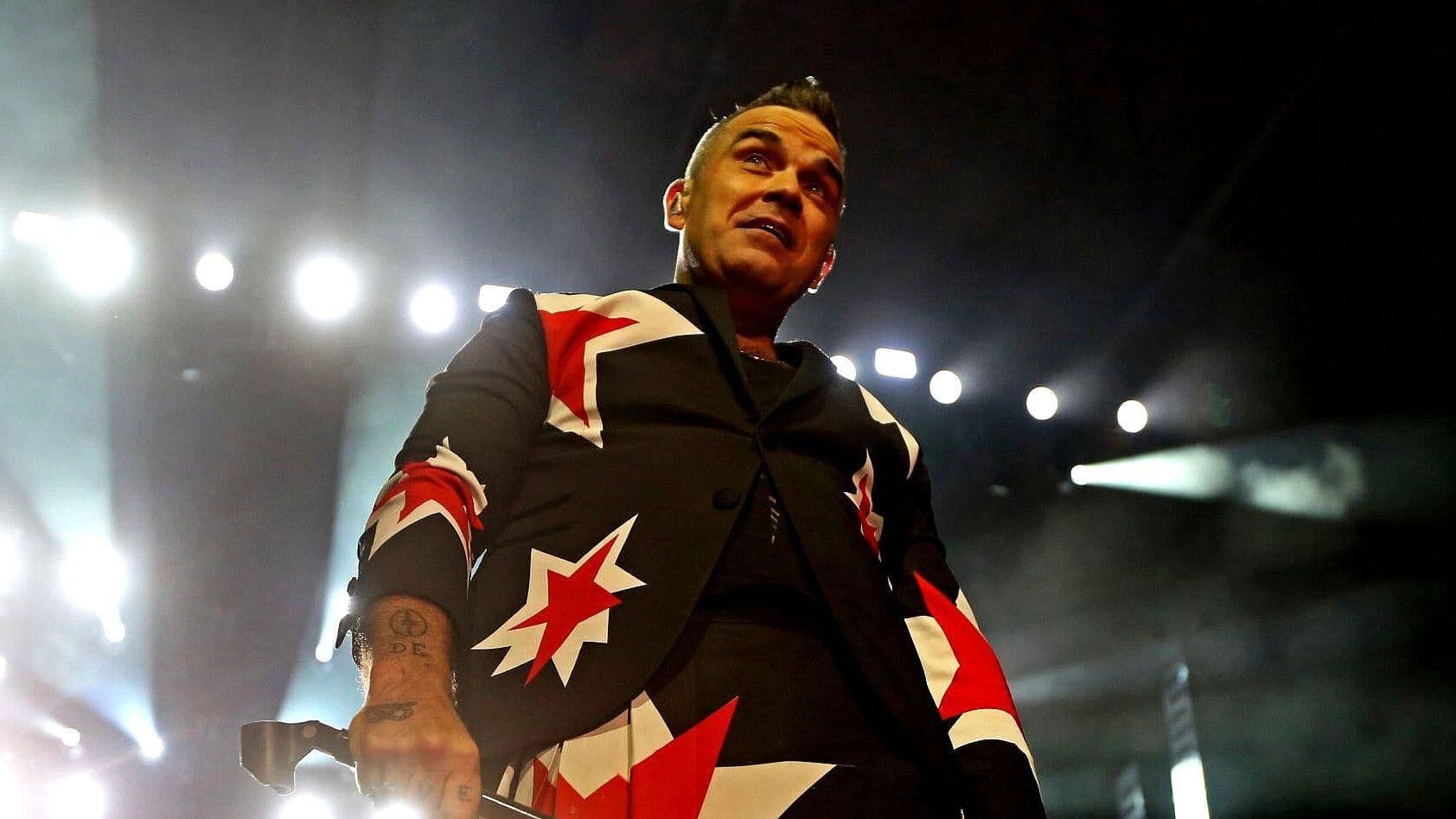 Robbie Williams Revela que se Hizo del Baño en Pleno Concierto