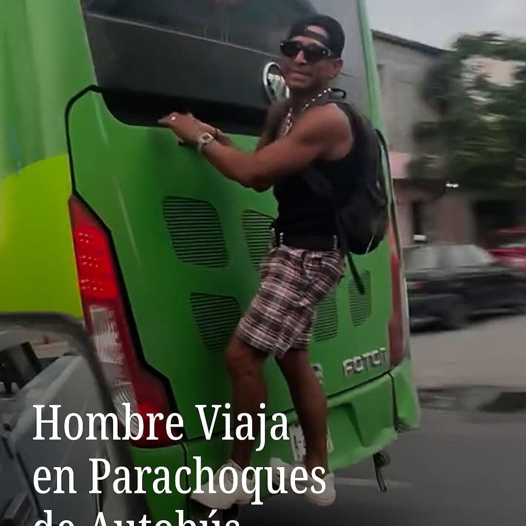 Hombre Viaja en Parachoques de Autobús