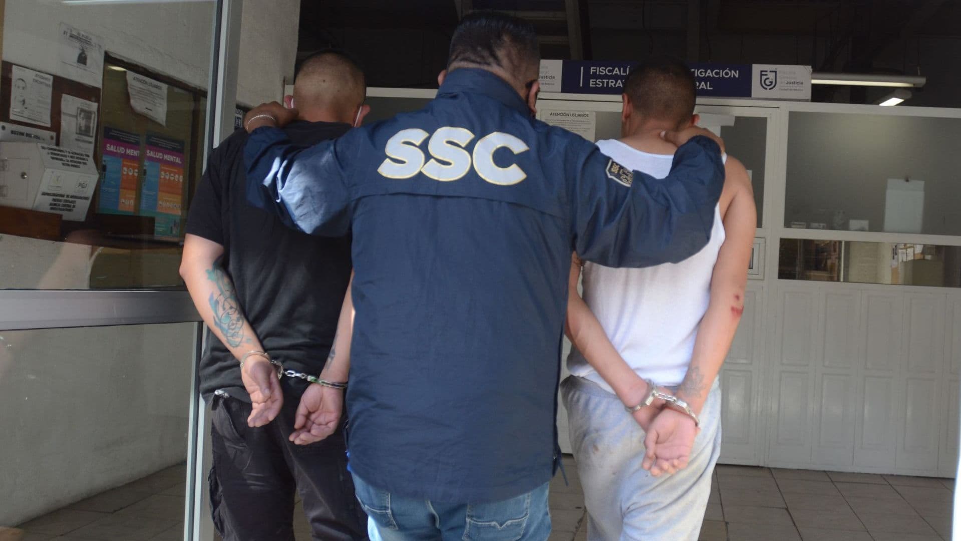 Hombres detenidos por SSC.