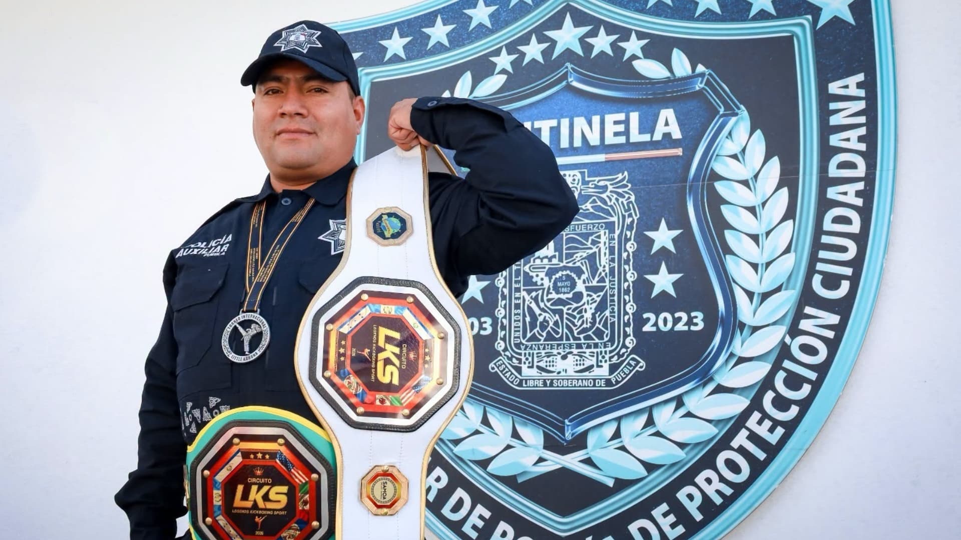 Gerardo Alfonso Germán de los Santos policía auxiliar y campeón en artes marciales.