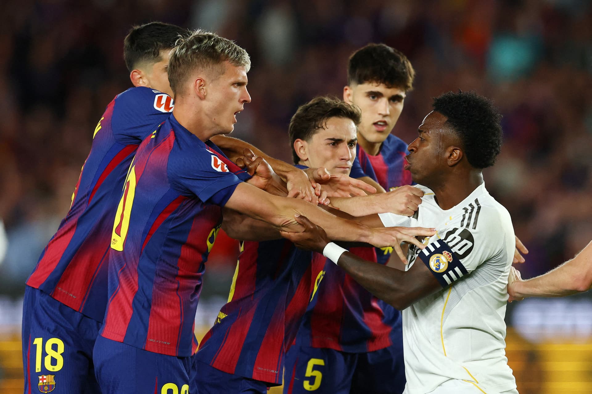 Jugadores de Real Madrid y Barcelona