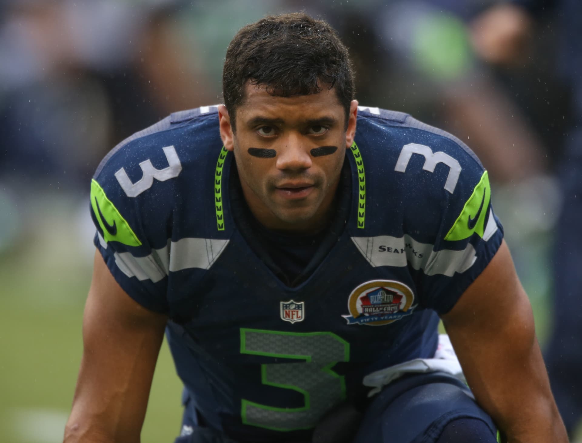 Russell Wilson durante un partido de la NFL con Seattle