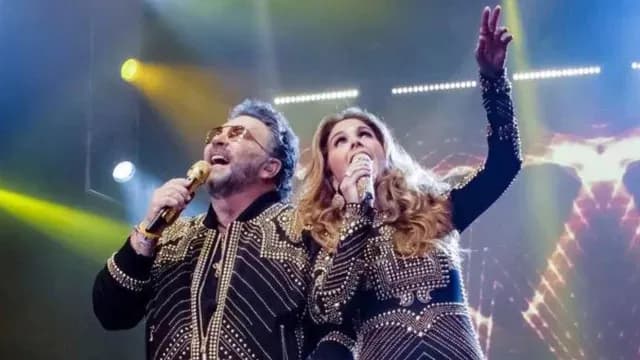 Mijares y Lucero durante un concierto