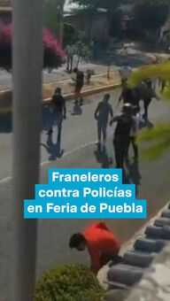 FOTO: Franeleros contra Policías en la Feria de Puebla